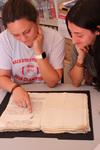 Students Examining a Document